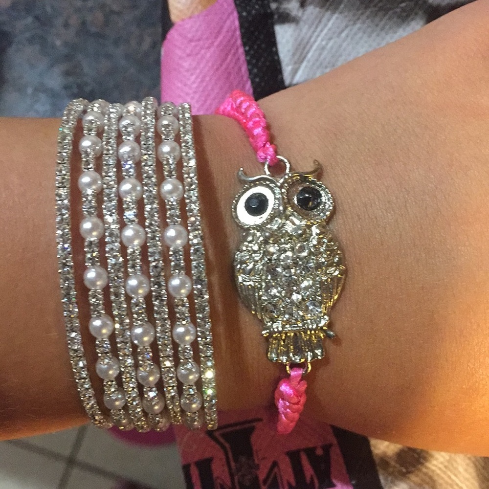 Two bling bracelets one is a owl custom pink
